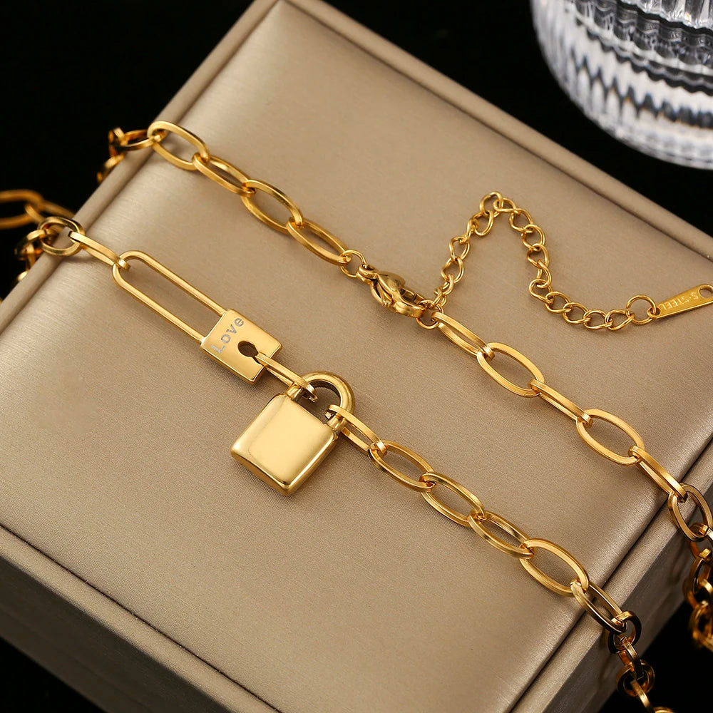 Veloura Lock Pendant Chain – Gold-Tone Stainless Steel Design