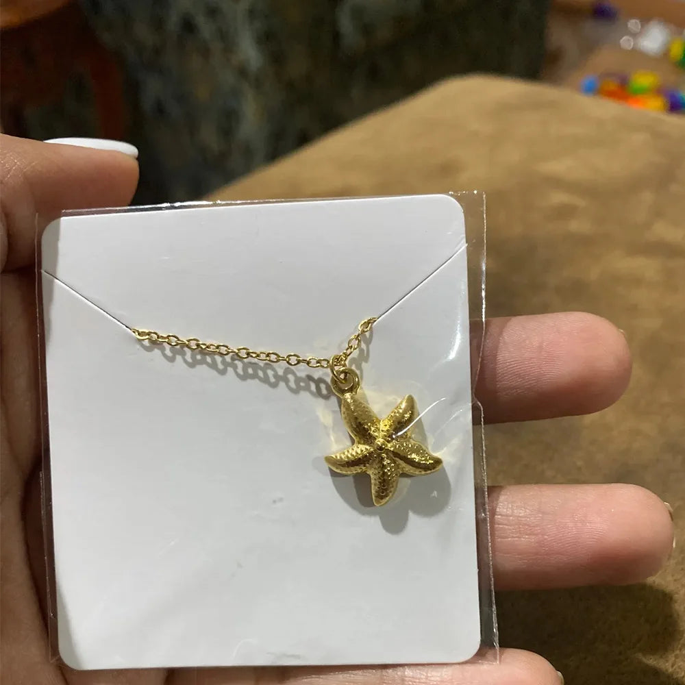 Veloura Oceana Pendant Necklace – Conch Shell Starfish Design